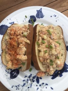 two shrimp salad sandwiches