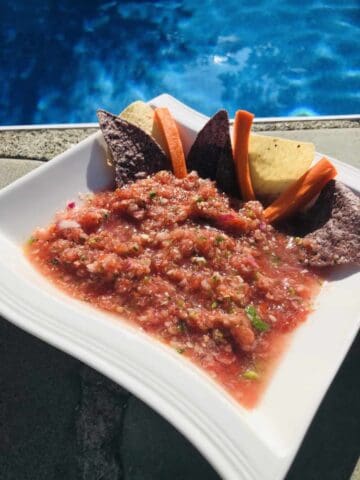 A bowl of Salsa by the pool