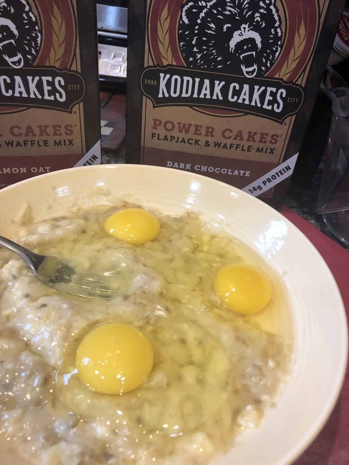 Cinnamon Oat Banana and egg Batter with a box of Kodiak Cakes Power Cakes mix