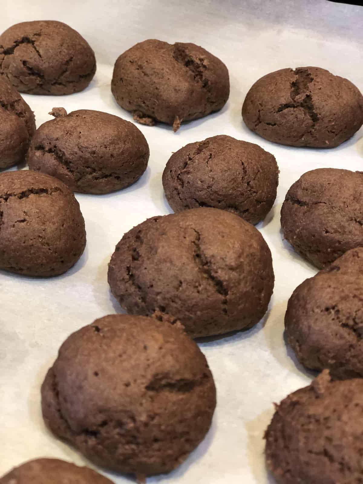 low fat chocolate cookie bon bons on parchment paper