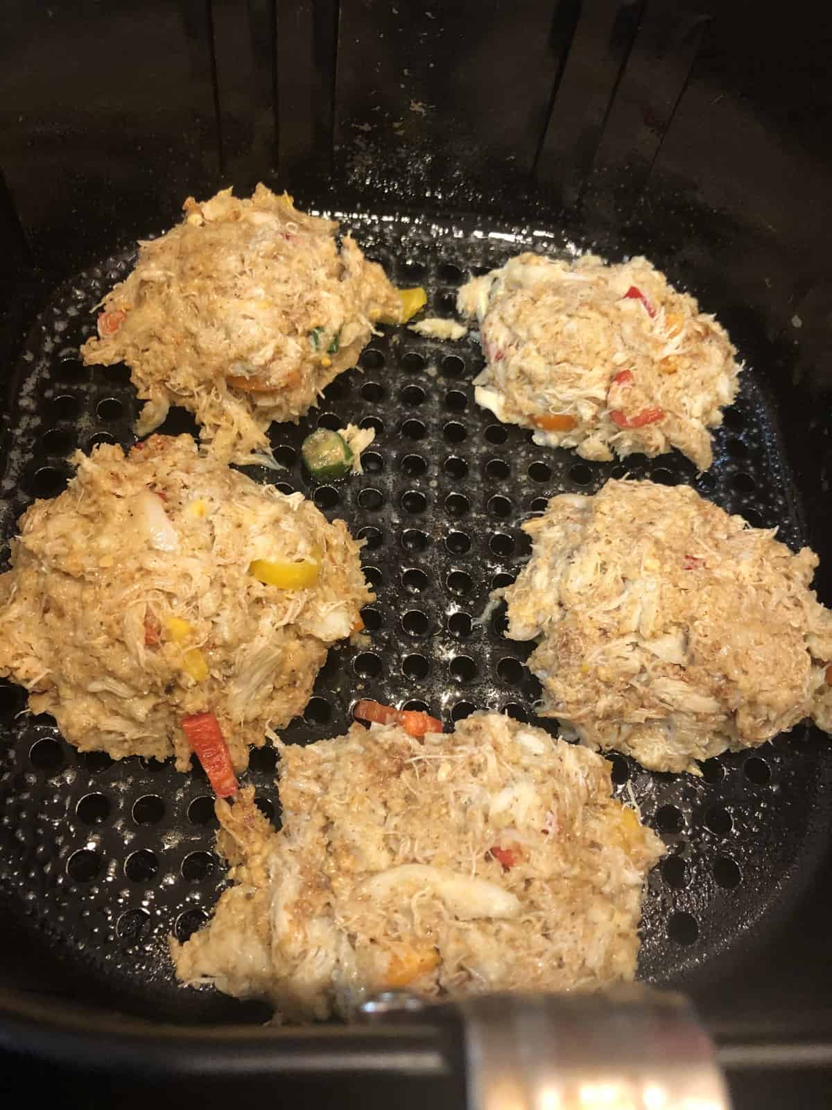 Five Fresh Crab Cakes in the Air Fryer basket