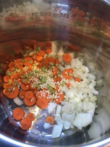 Sauteeing vegetables in the Instant Pot for the homemade chicken noodle soup