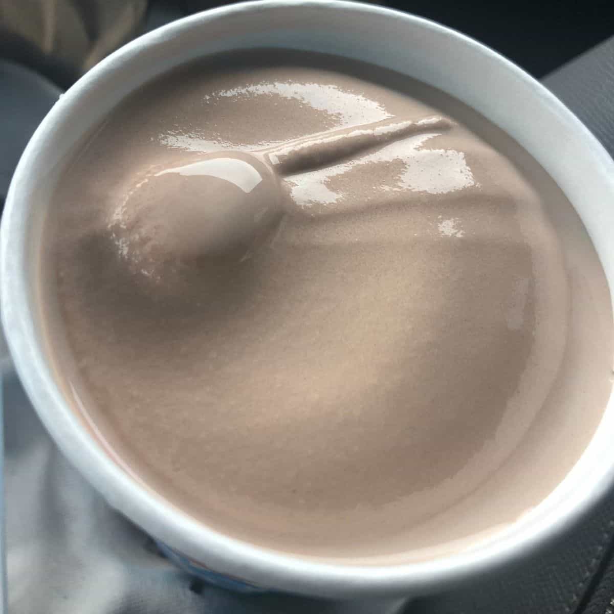 Wendys Chocolate Frosty in a white cup