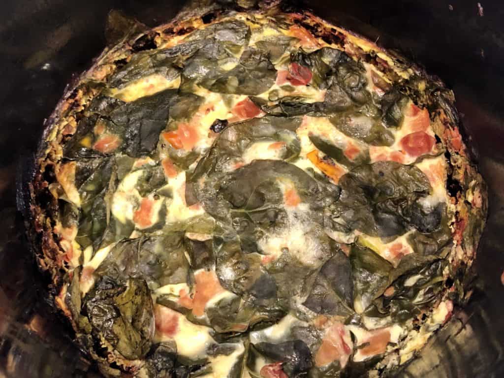 Crockpot Spinach Frittata in the black crockpot