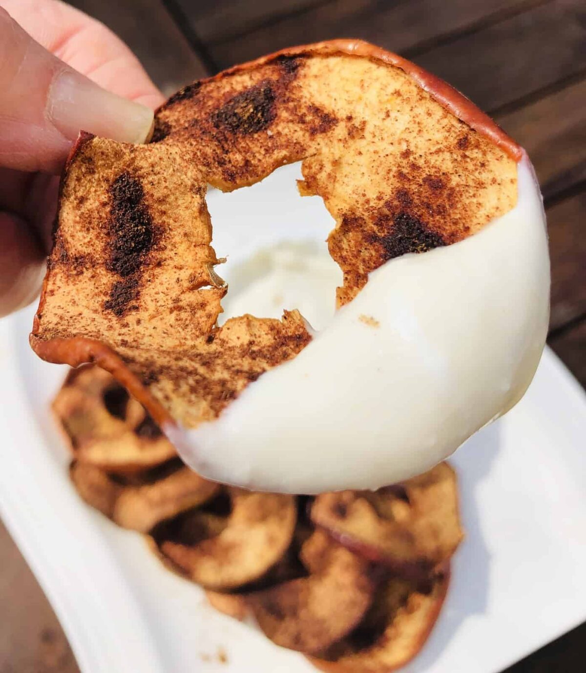 Dipping a Baked Apple Chip