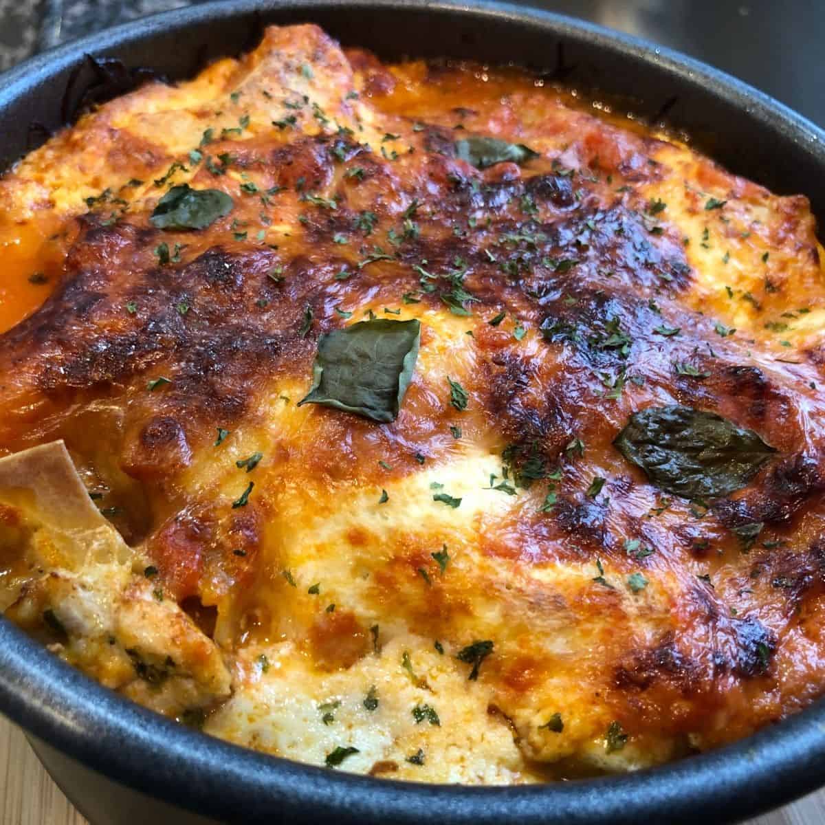 Baked Instant Pot Lasagna in a round pan