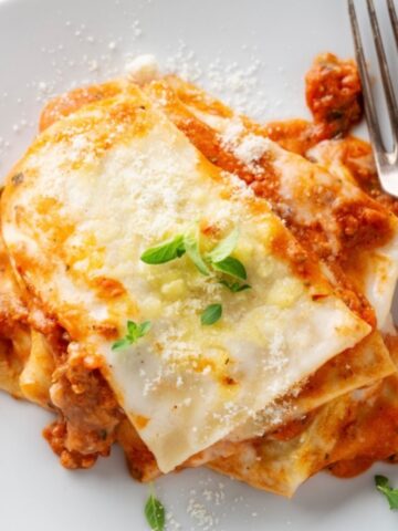 Lasagna on a plate with a fork