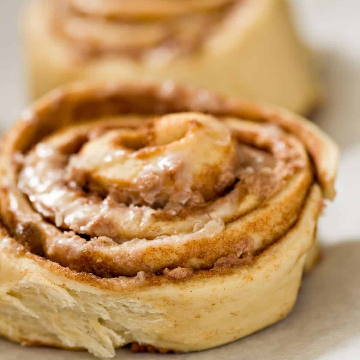 Air Fried Cinnamon Roll on parchment paper