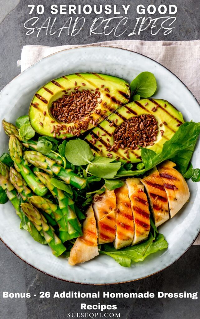 Sliced Avocado Asparagus spinach and sliced grilled chicken on a white plate