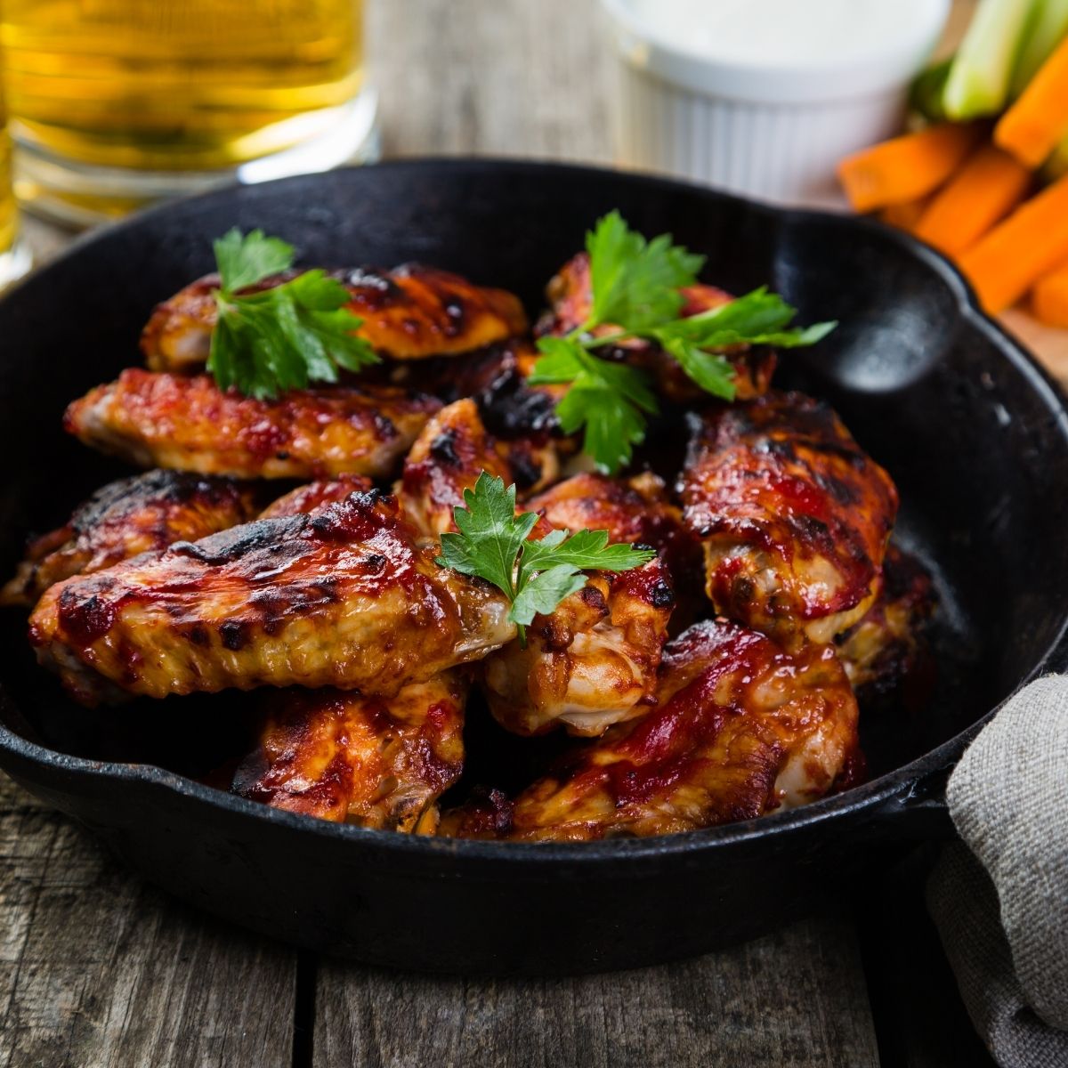 Chicken in a cast iron skillet with parsley