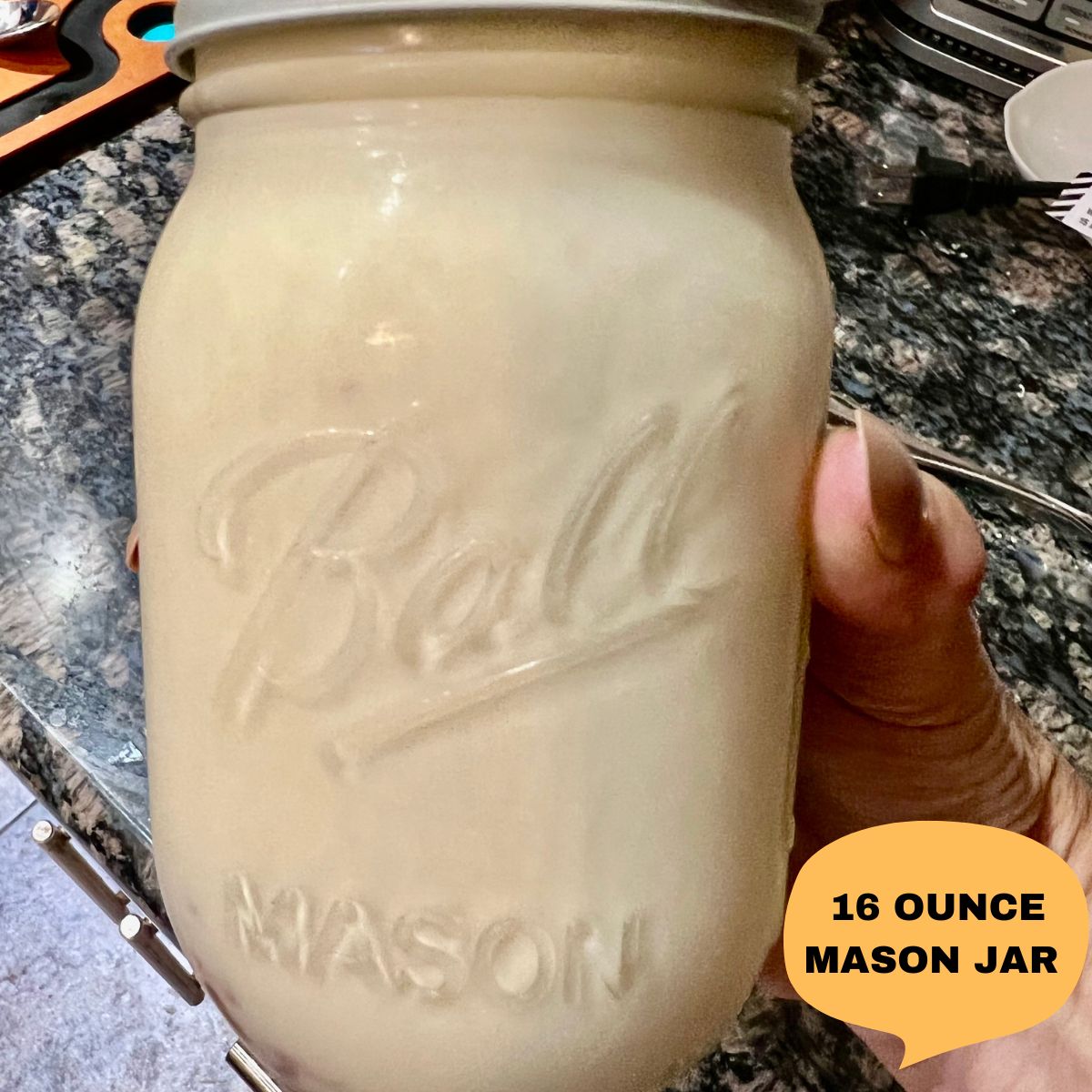 16 ounce glass mason jar filled with ice cream