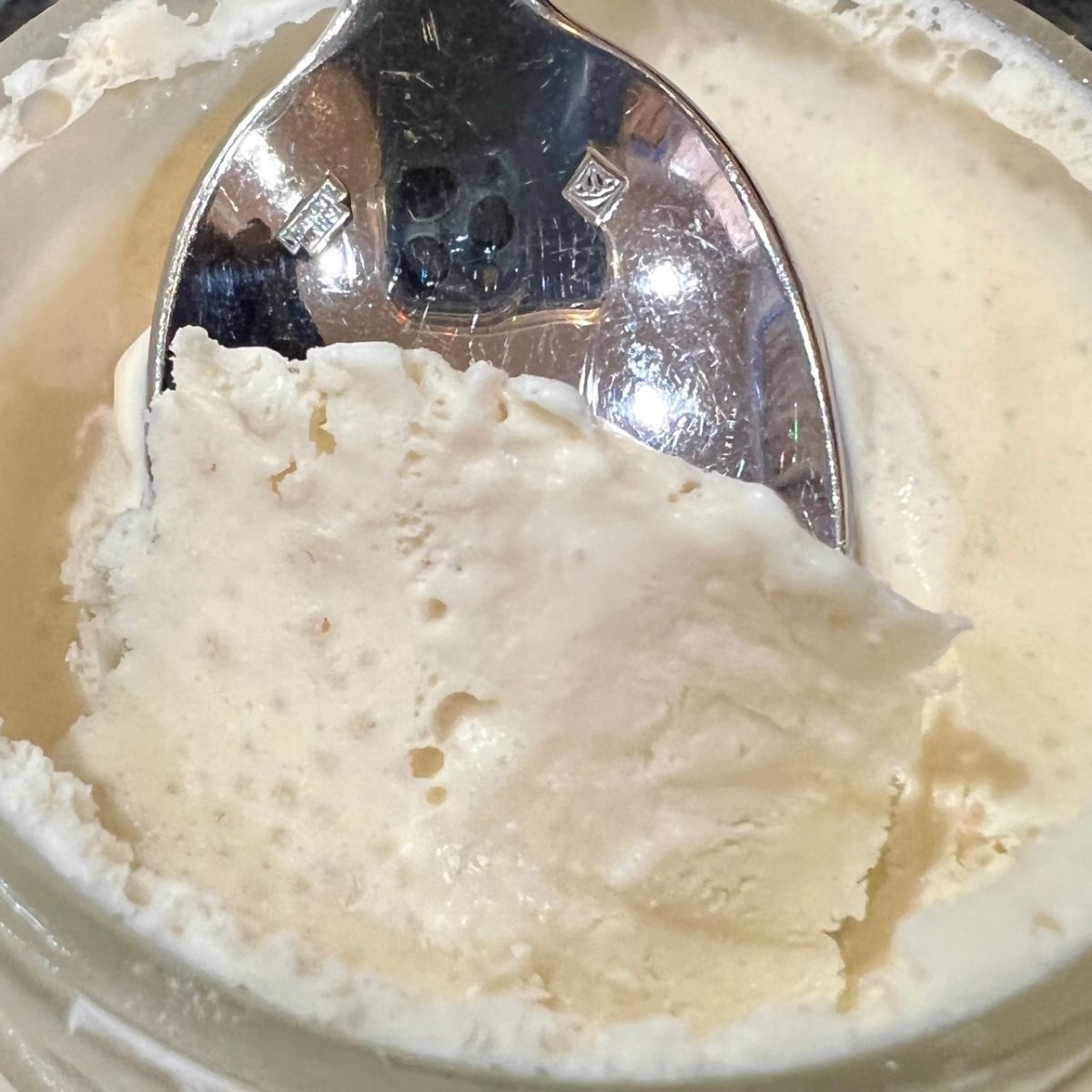 Homemade mason jar ice cream in a spoon