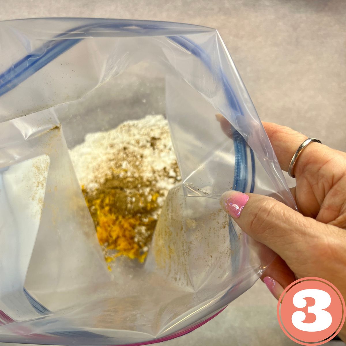 Powdered sugar, cinnamon and orange zest in a ziplock baggie