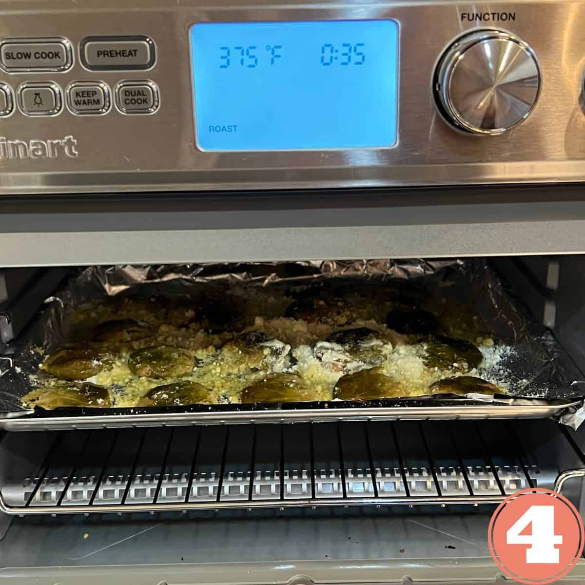 Brussel sprouts in a Cuisinart air fryer roasting
