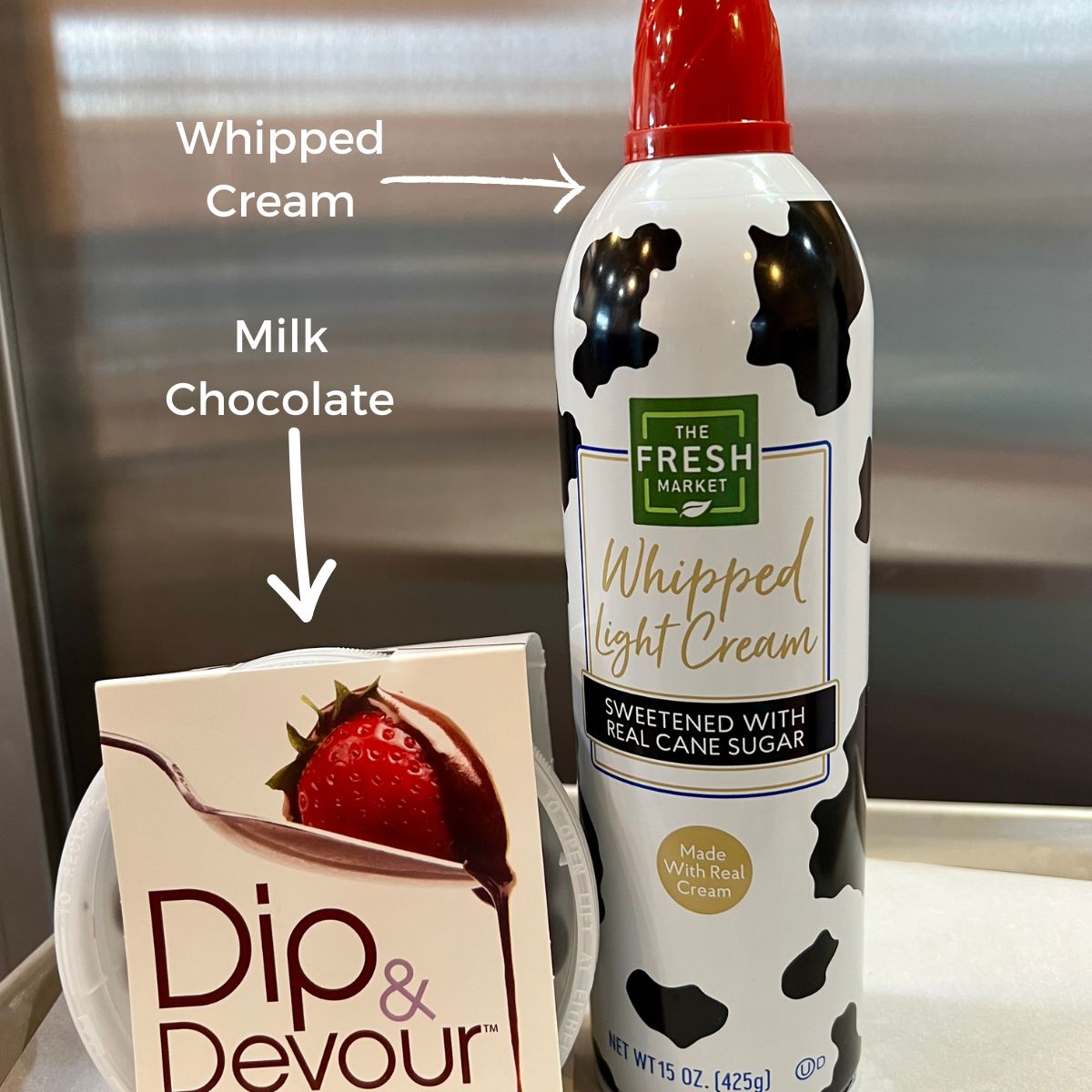 A can of light whipped cream and a package of milk chocolate dip & Devour