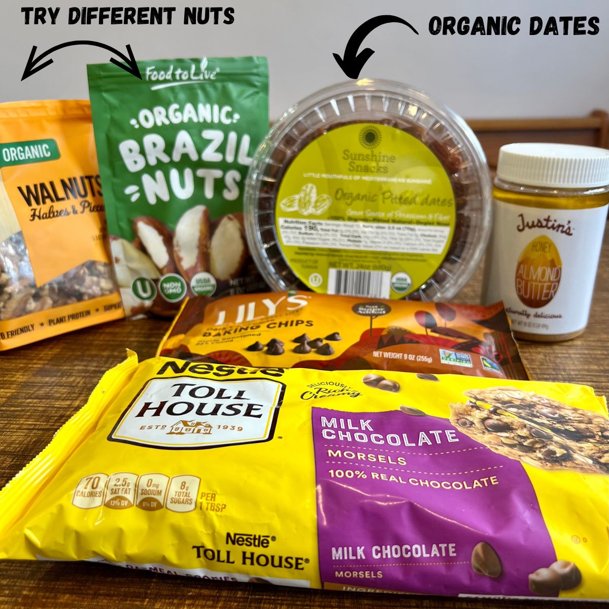 Ingredients for healthy snicker bars walnuts, Brazil nuts dares, almond butter and chocolate chips