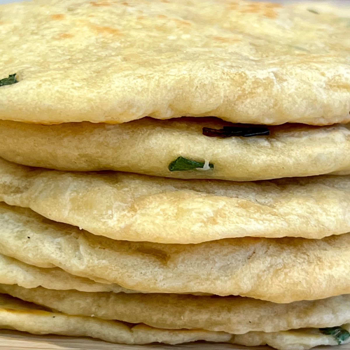 A stack of easy vegan flour tortillas