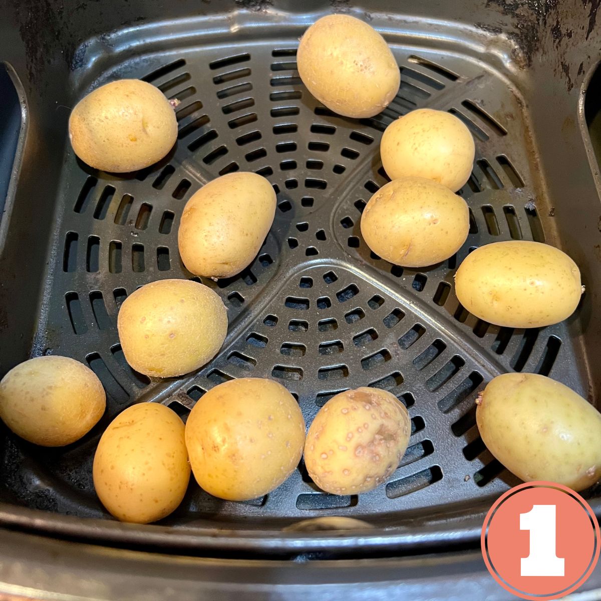 Mini golden potatoes in an aibfryer basket