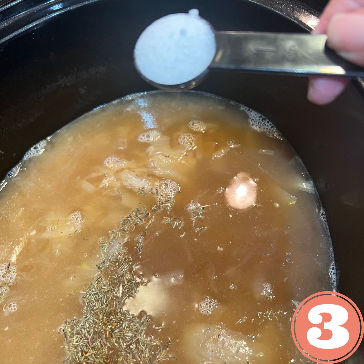 Adding a teaspoon of sugar to a crockpot with onion soup in it