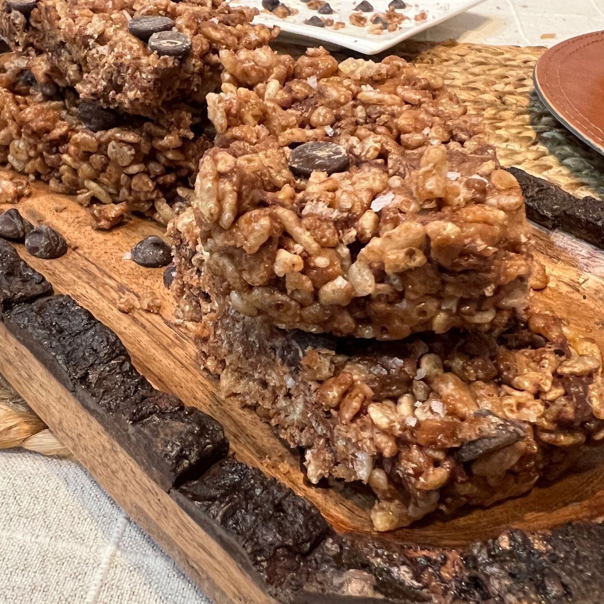 Healthy Rice Krispies treats stack on a wooden tray
