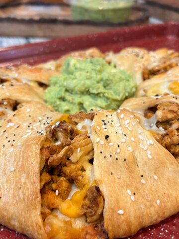Crescent roll taco ring with guacamole in the center