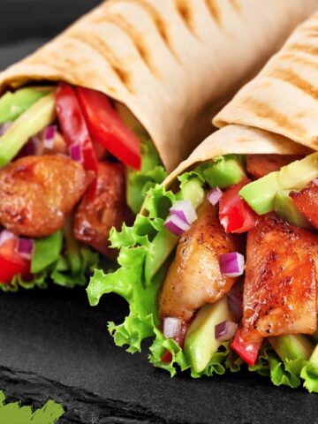Two grilled chicken wraps with lettuce