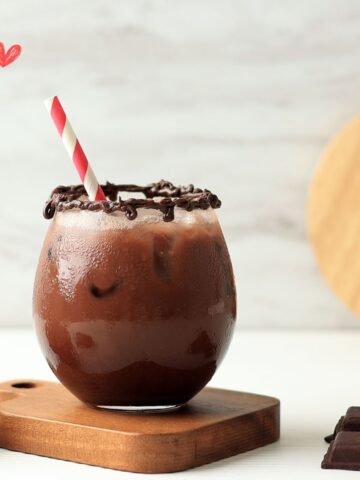 Weight Watches hot chocolate cold brew in a glass with a red straw