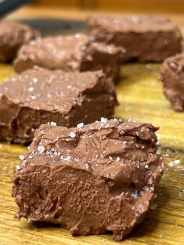Weight Watchers chocolate fudge squares on a wooden cutting board