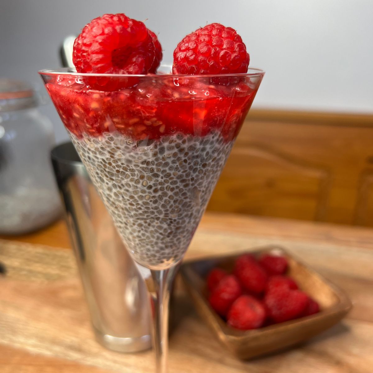 A glass of raspberry chia pudding