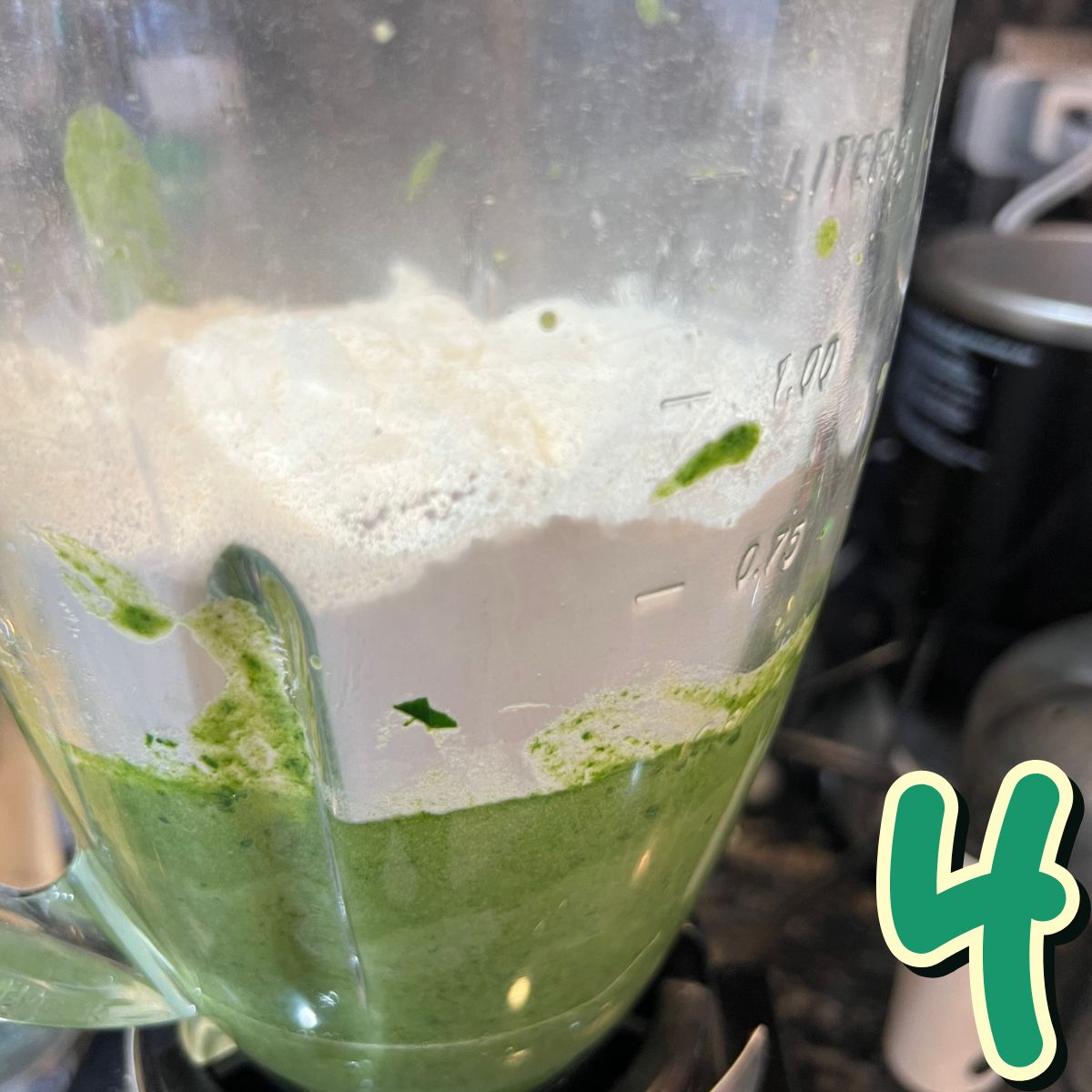 Self rising flour in a blender with green muffin batter