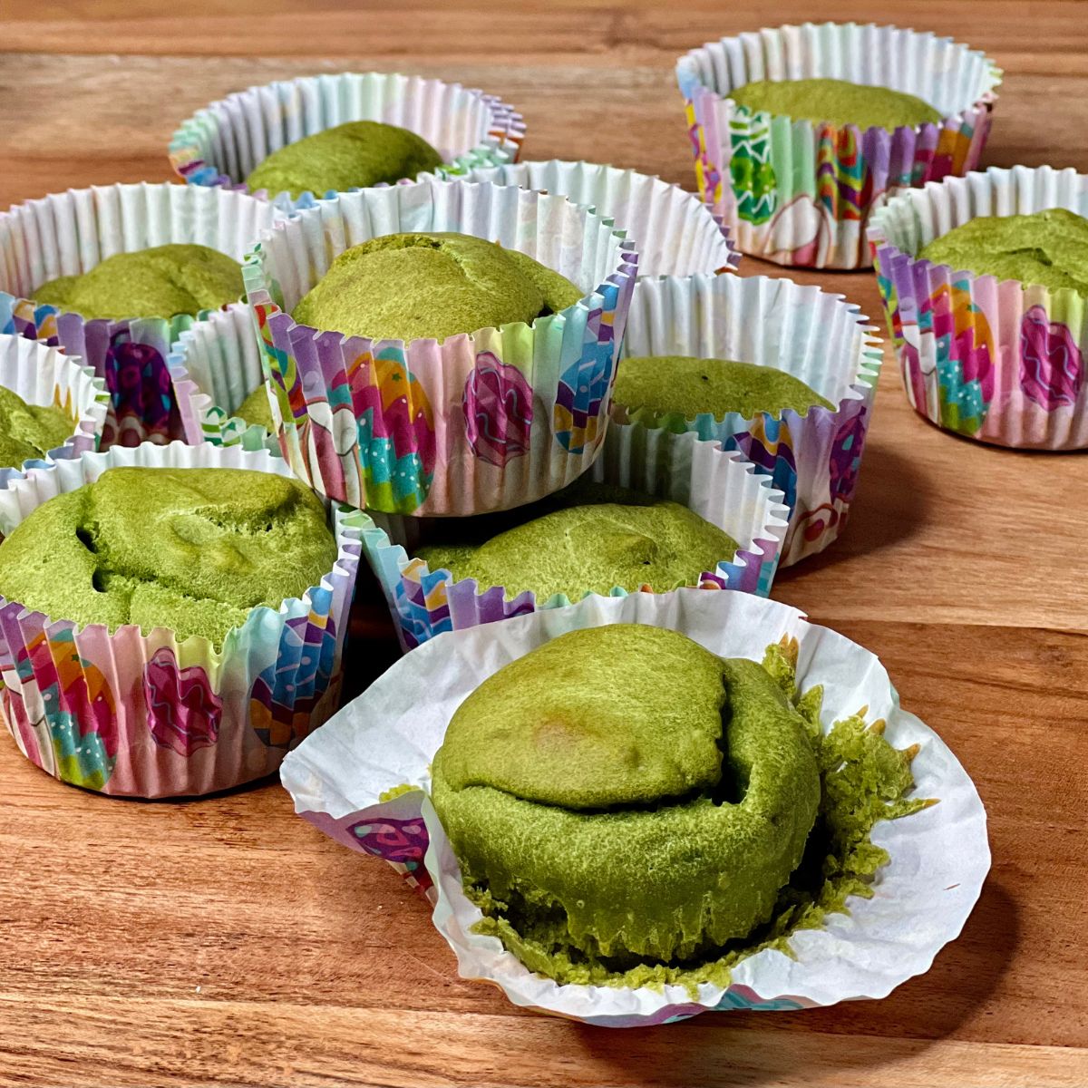 Green Goddess Hulk Muffins on a wooden table