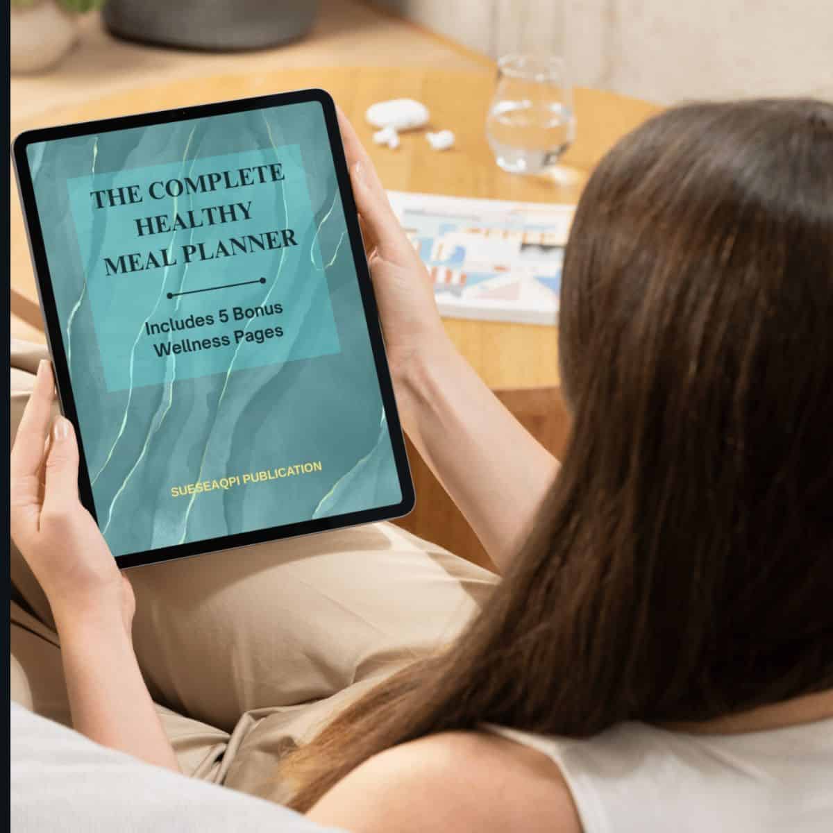 Girl reading healthy meal planner