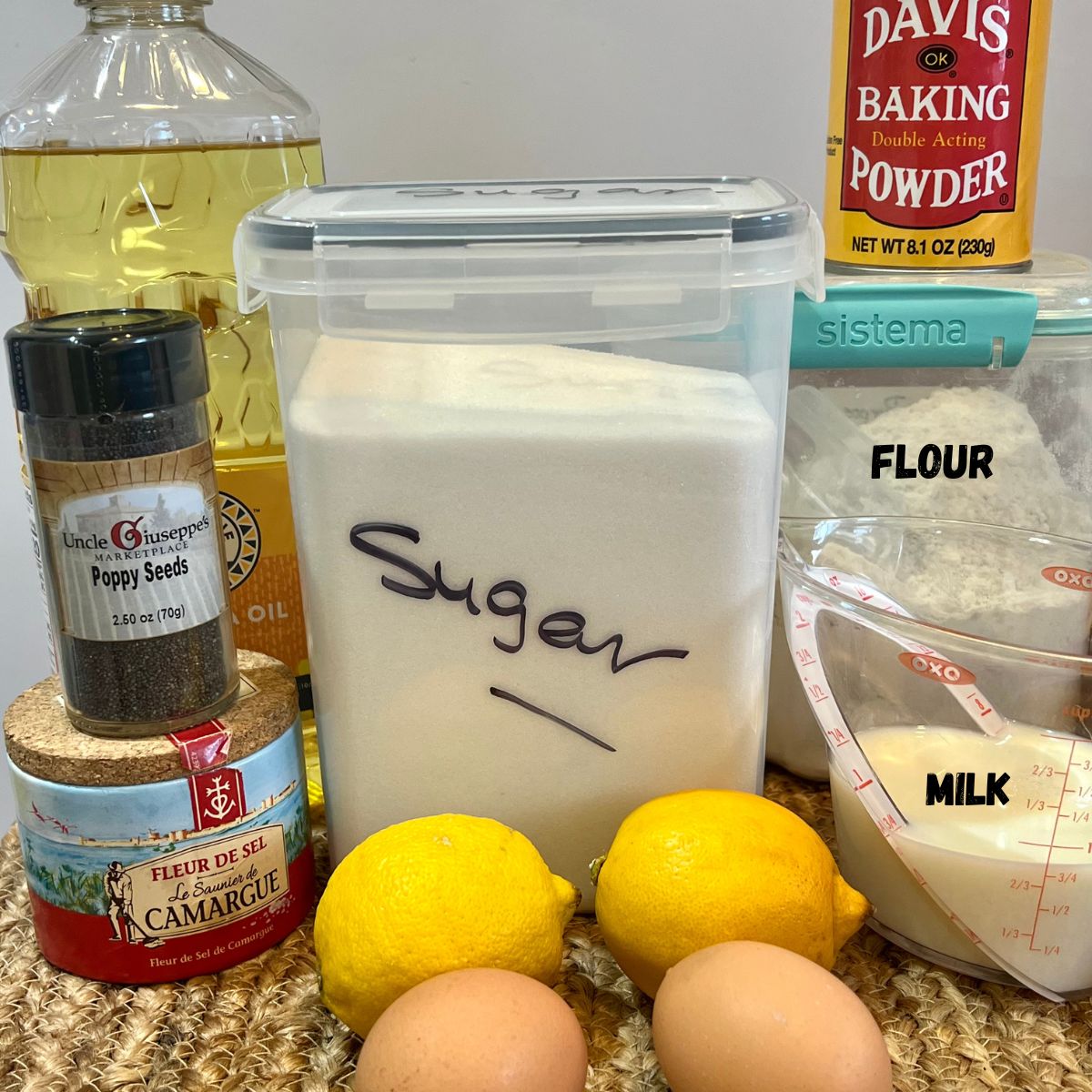Canola Oil, Poppy Seeds, Salt, 2 lemons, 2 eggs, sugar, flour and baking powder