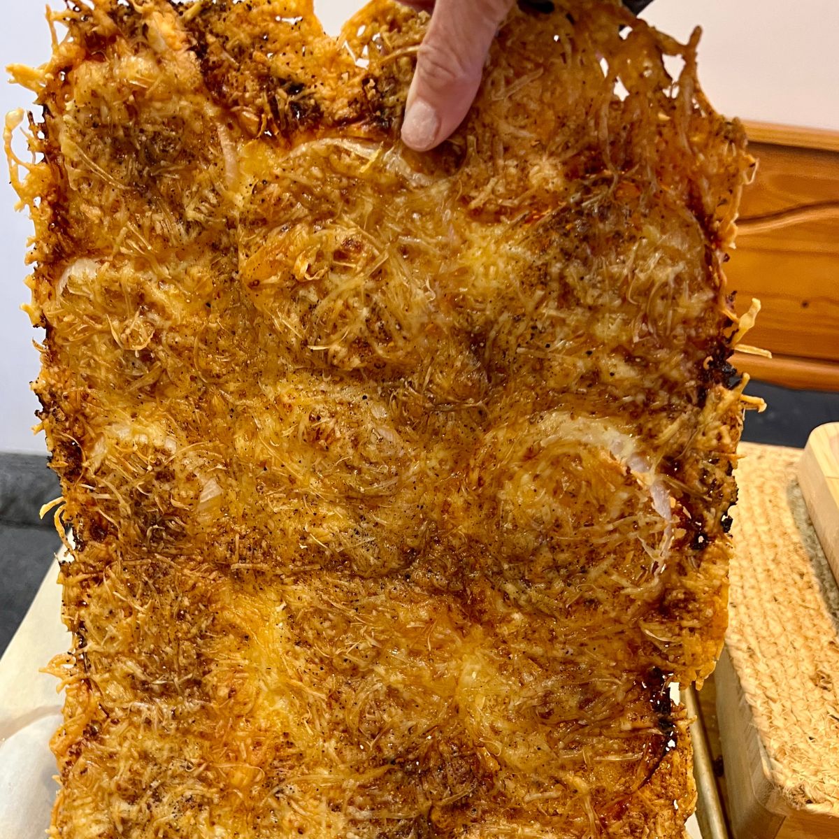 A sheet of baked crispy onion rings