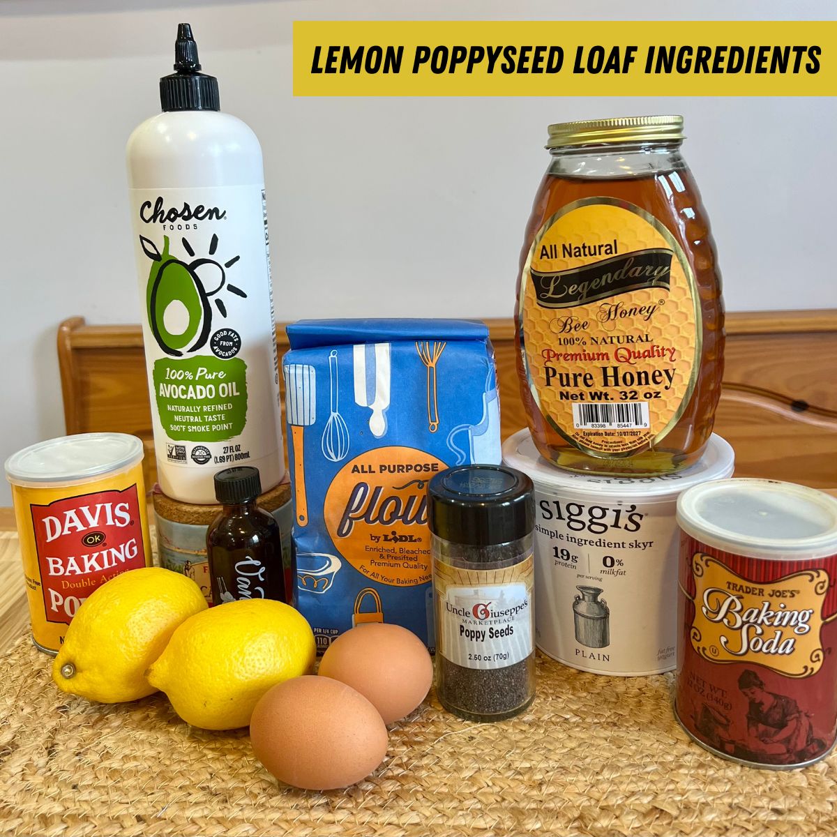 Honey lemon poppyseed loaf ingredients on a table