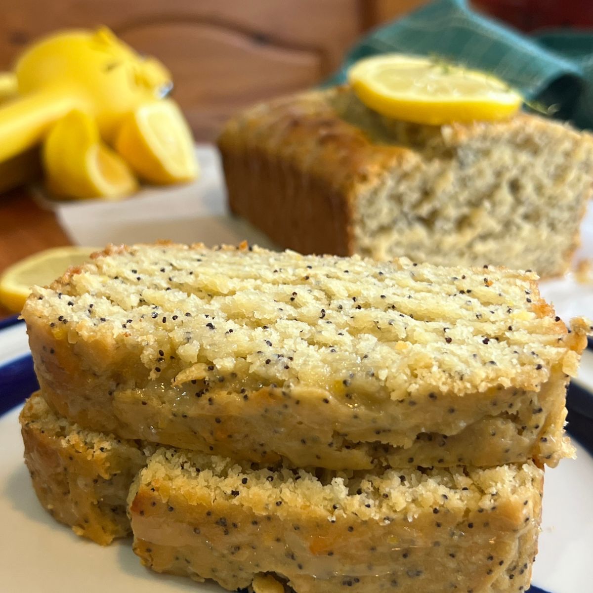 Slices of a healthy lemon poppyseed loaf on a plate