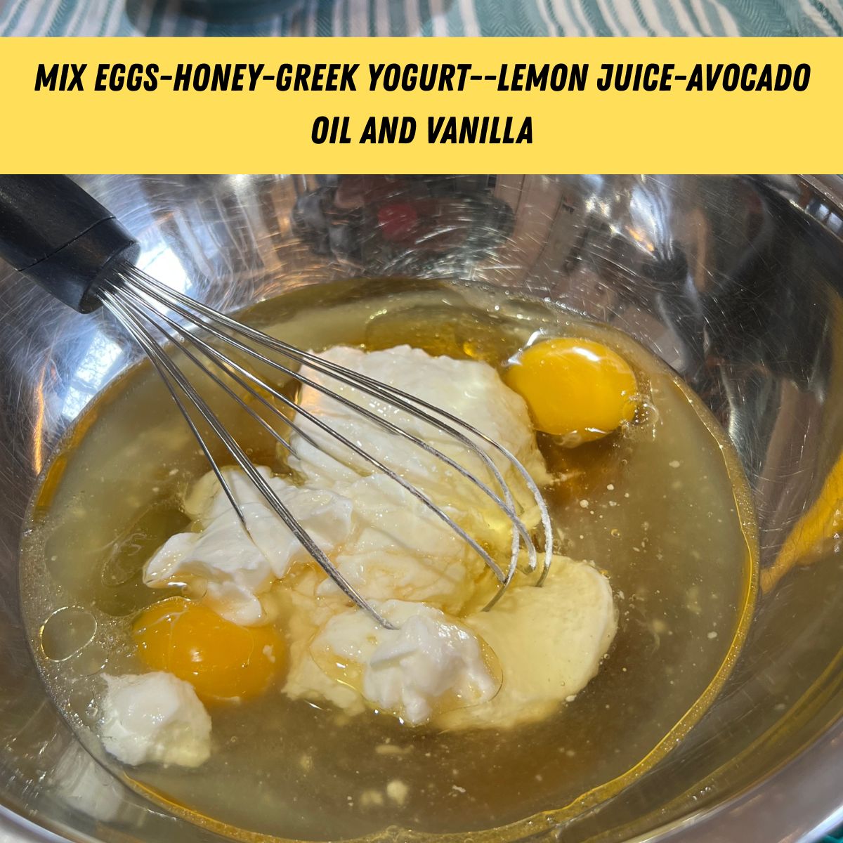 Wet ingredients for a lemon loaf cake in a bowl