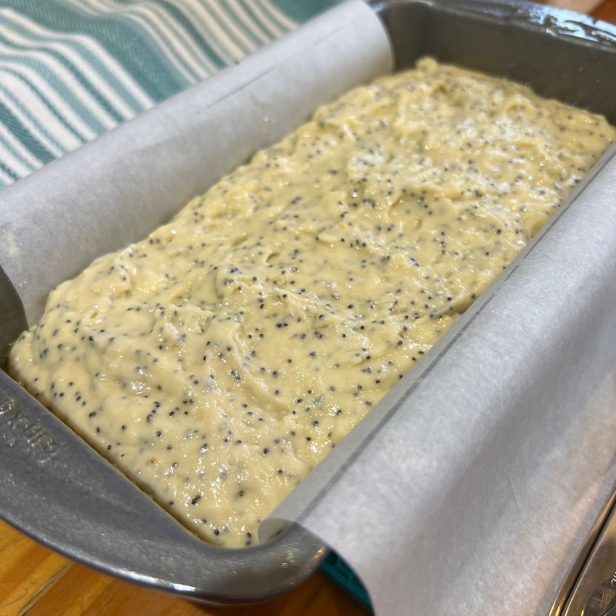 Honey lemon loaf batter in a 9x5 baking loaf pan