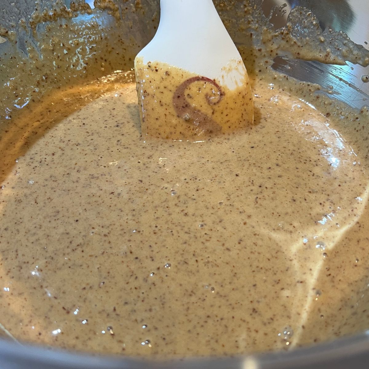 Healthy blueberry muffin batter in a bowl