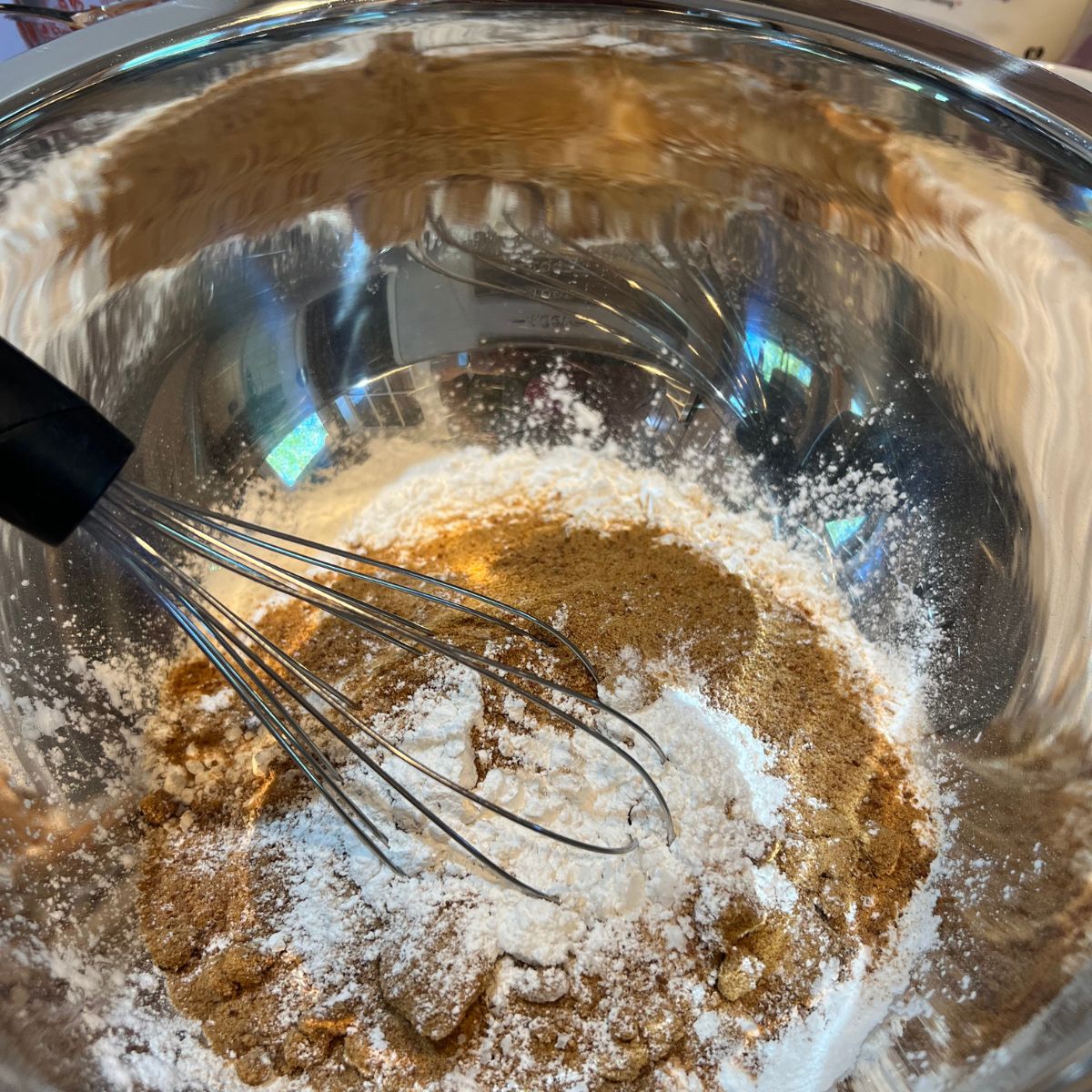 To Die For Blueberry Muffins dry ingredients in a bowl with a whisk