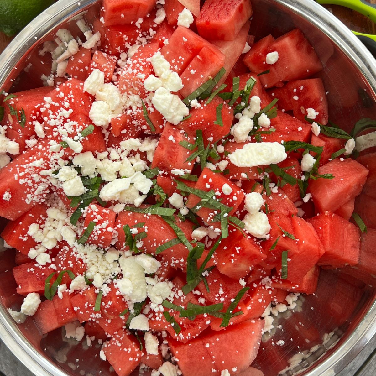 Feta cheese on watermelon with fresh mint