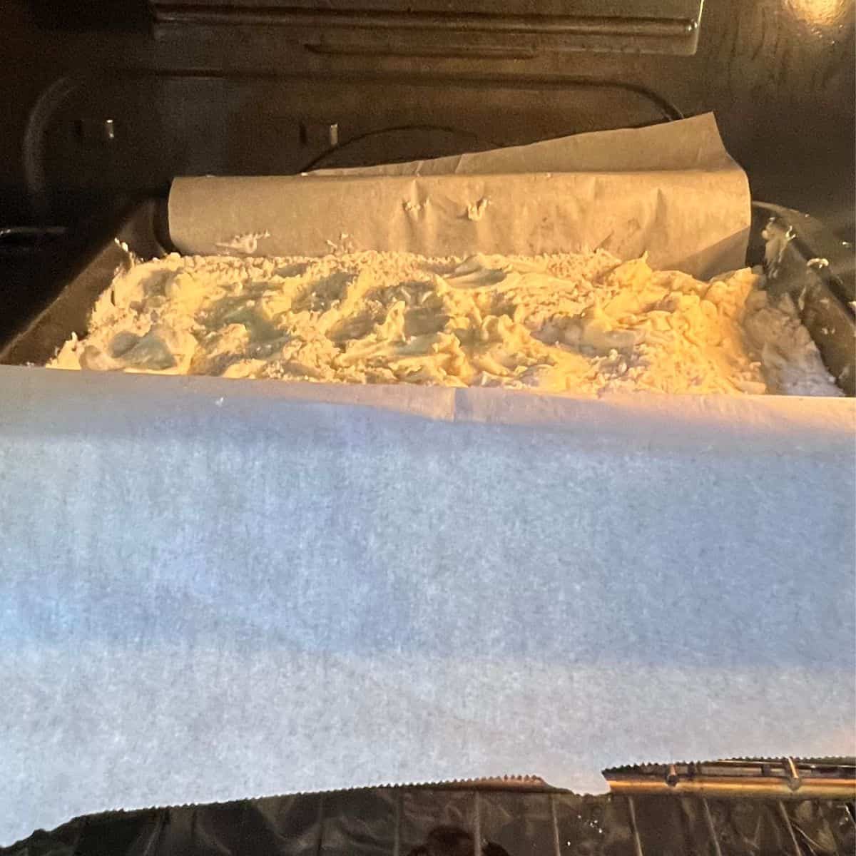 Baking a 4 Ingredient Lemon Curd Dump cake in the oven