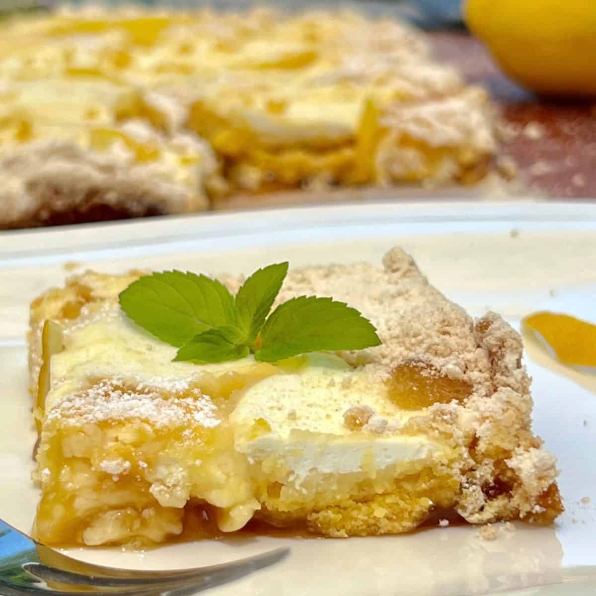 r Ingredient Lemon Curd Dump Cake on a white plate
