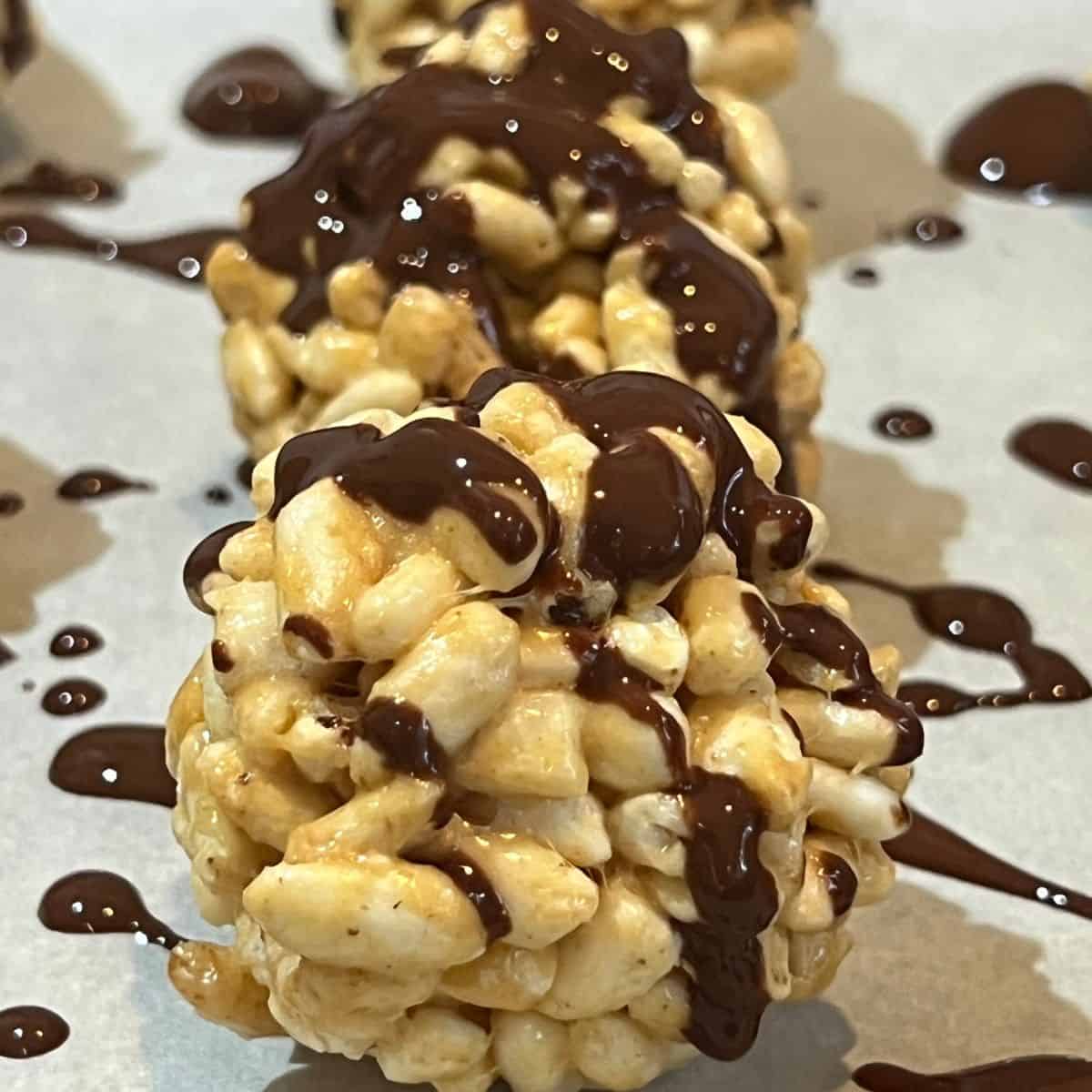 Chocolate Drizzled Peanut Butter Rice Balls