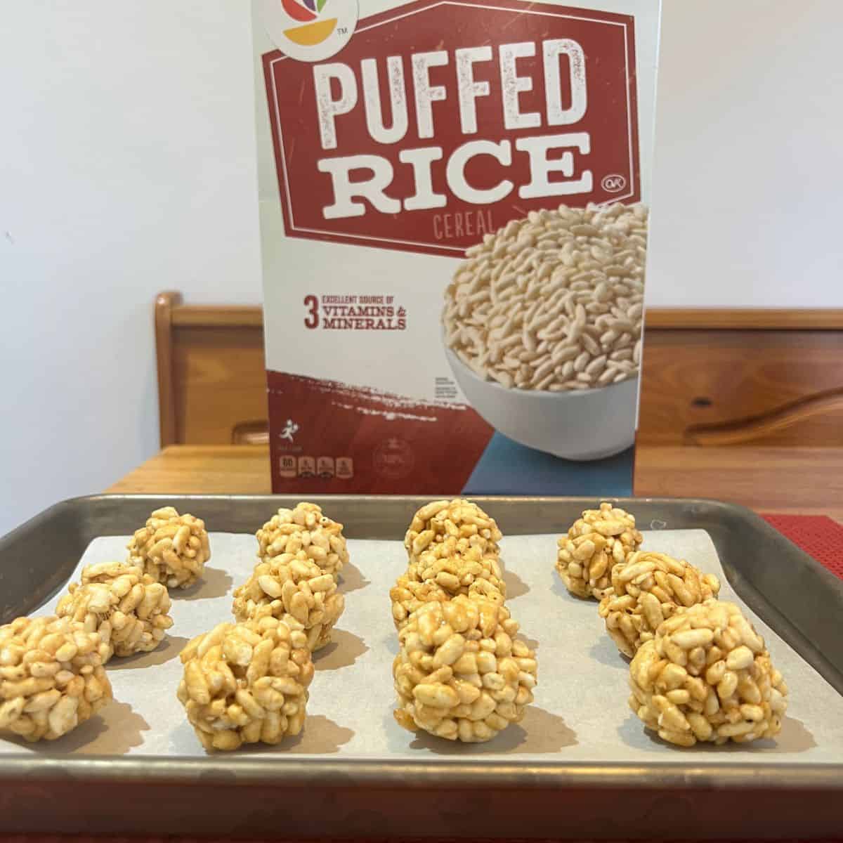 Puffed rice balls on a sheet pan