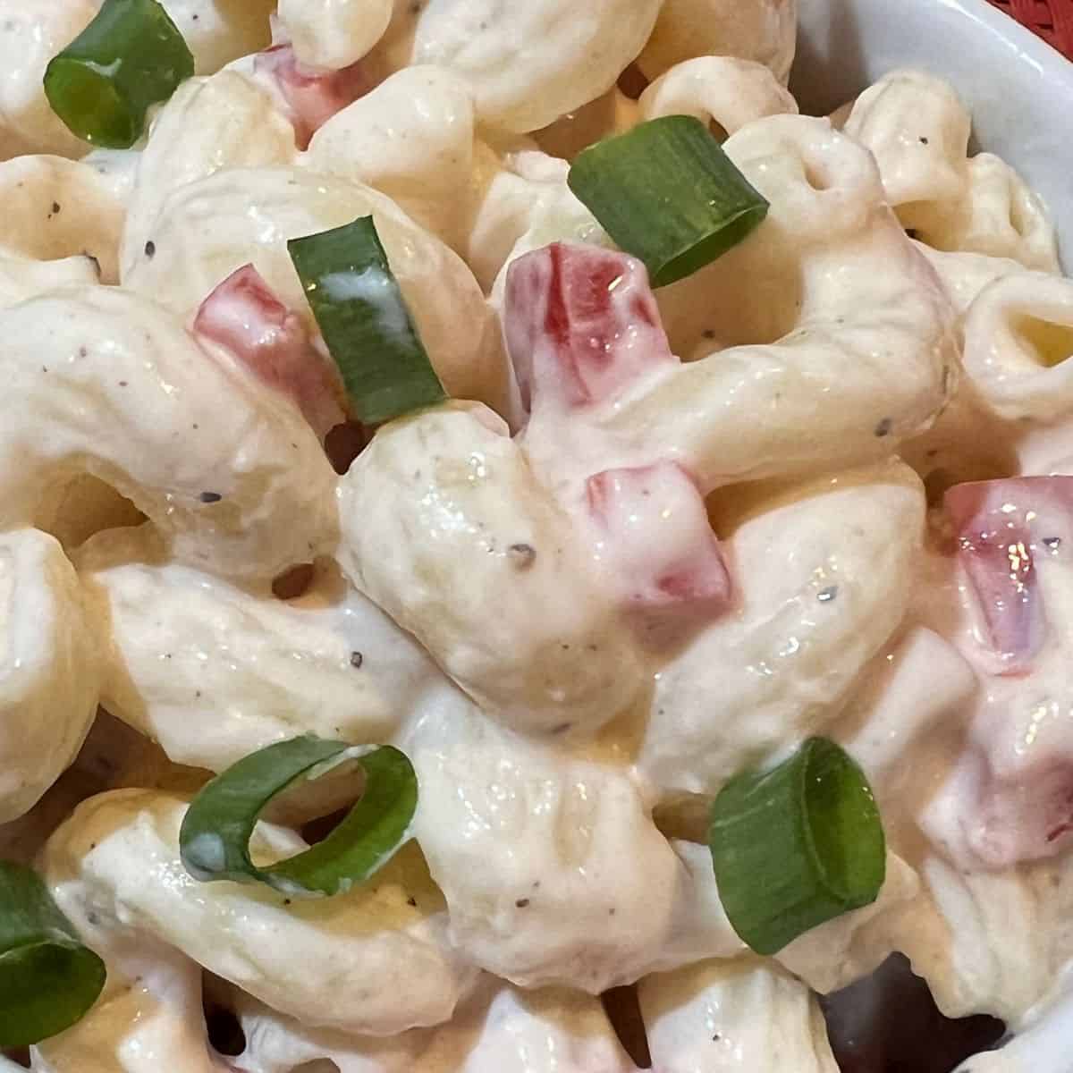 Creamy pasta salad with scallions