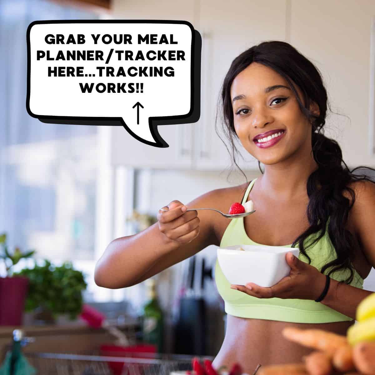 Female holding a bowl of fruit