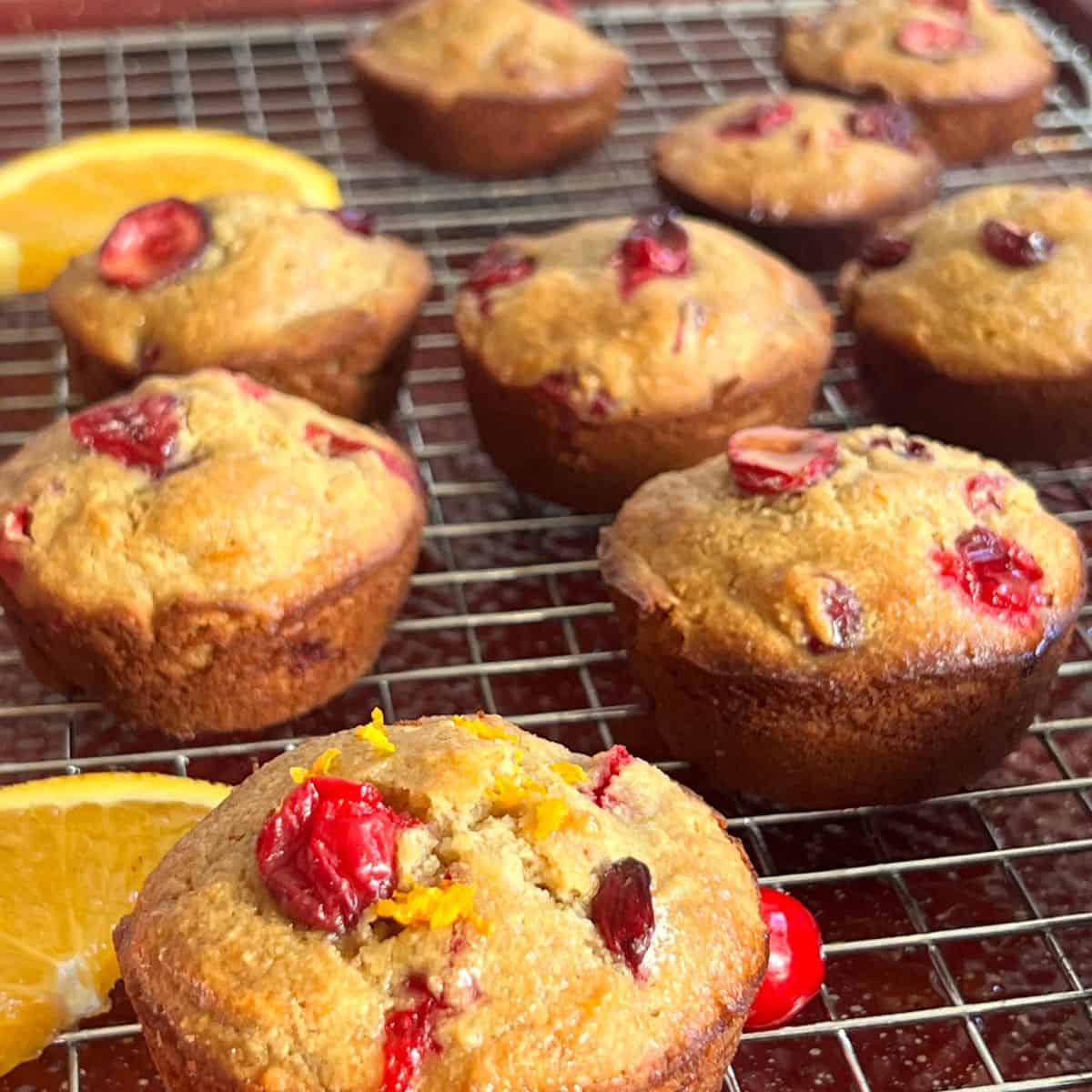 Healthy Cranberry Orange Muffins cooling on a wire rack