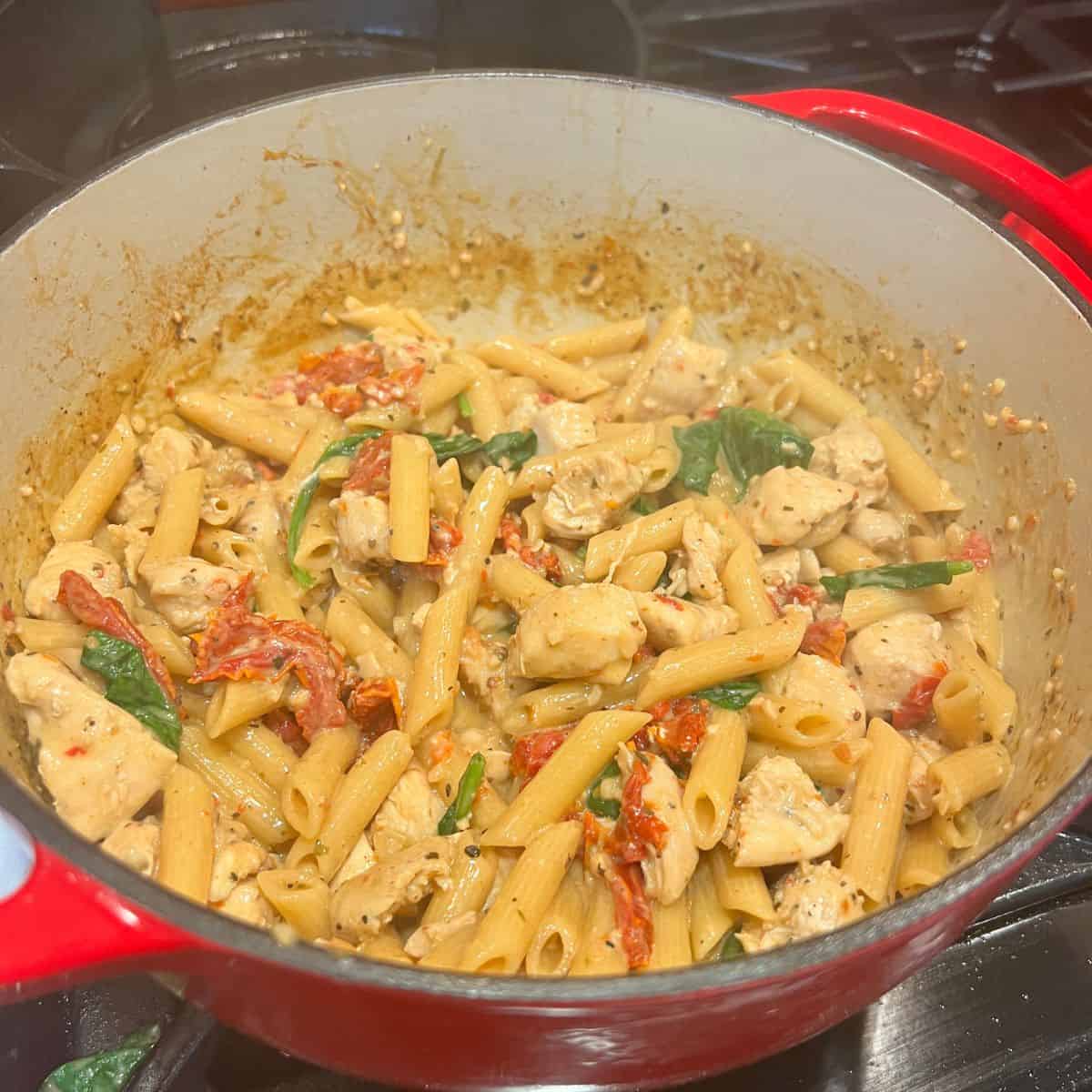 Creamy Marry Me Chicken and Pasta in a dutch oven