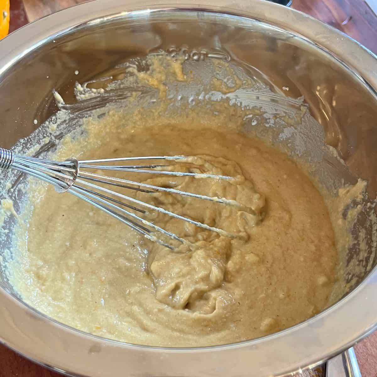 Cranberry Orange muffin batter in a mixing bowl